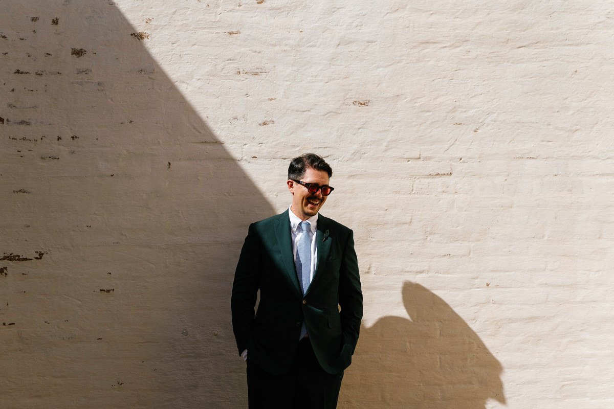 Groom portrait during a destination wedding at São Lourenço do Barrocal in Alentejo, captured on digital camera by Arte Magna wedding photographer